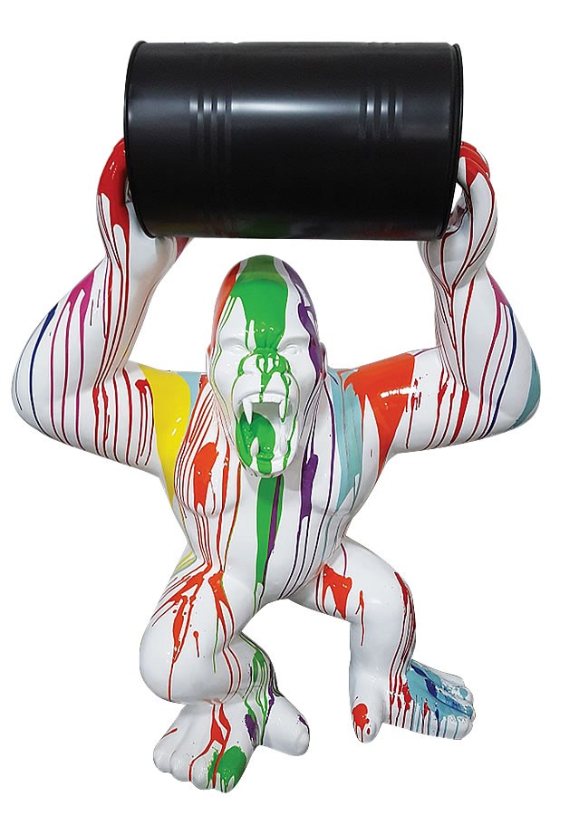 Multicolored king-kong gorilla statue white background with barrel