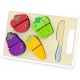 Children's cutting board with vegetables