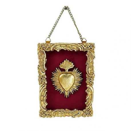 Decorative frame Ex-voto heart flames golden color on red background with chain